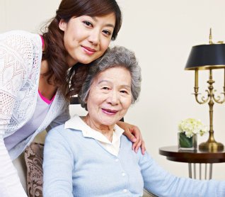 two woman smiling